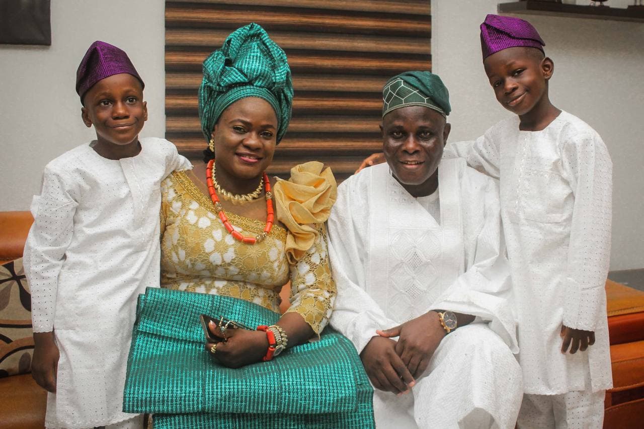 With his wife and sons