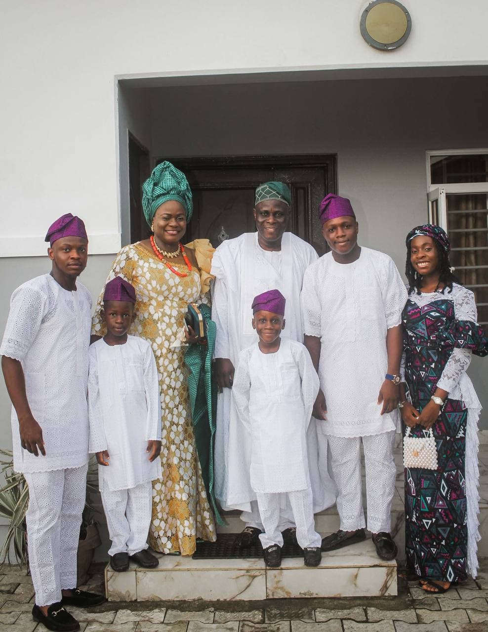 Comrade Ayeola with his wife and children at their home